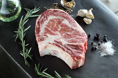 DLM Prime Natural Beef Bone In Ribeye Steak